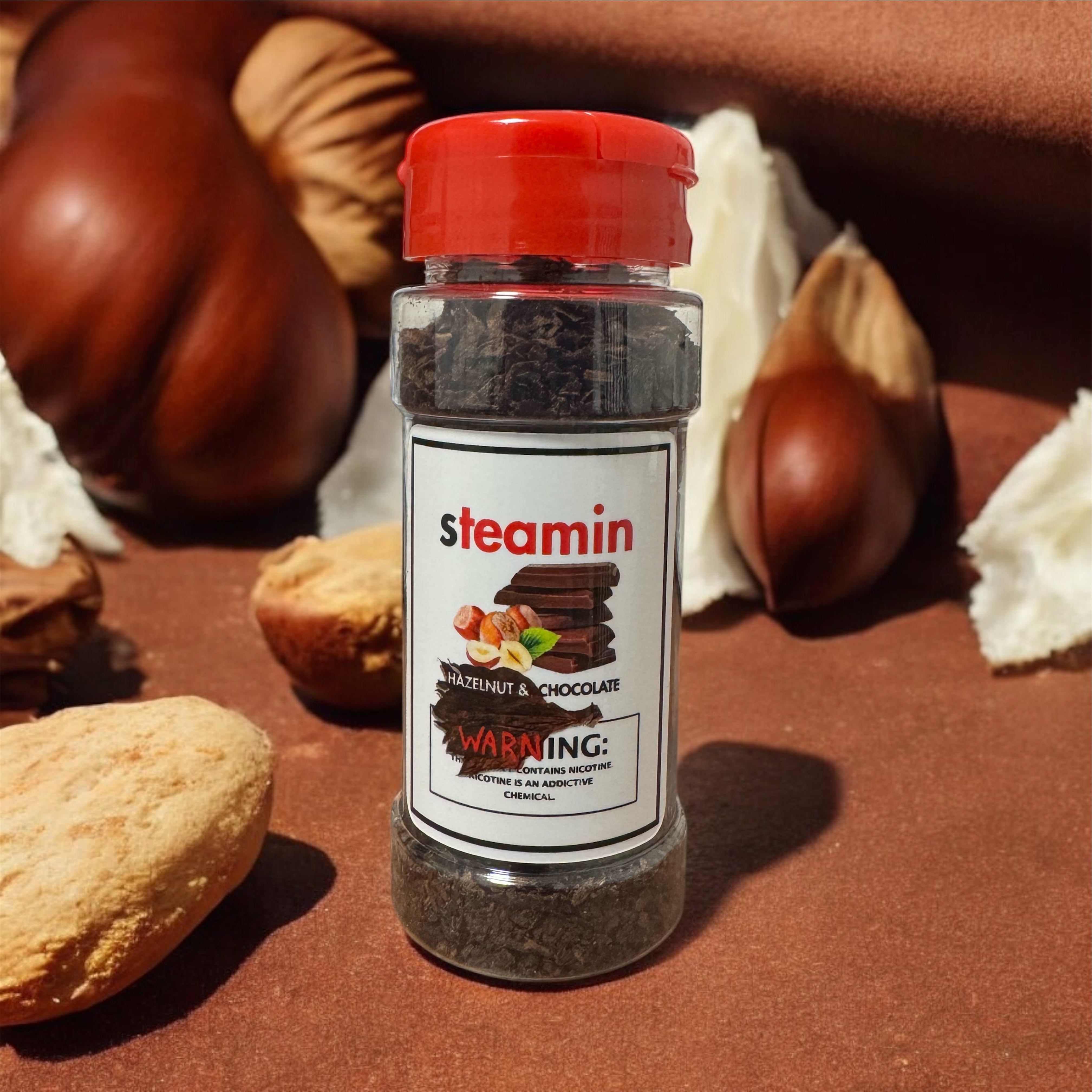 Steamin Hazelnut & Chocolate flavoring shaker jar with nuts and chocolate on brown background – cannabis accessory Toronto