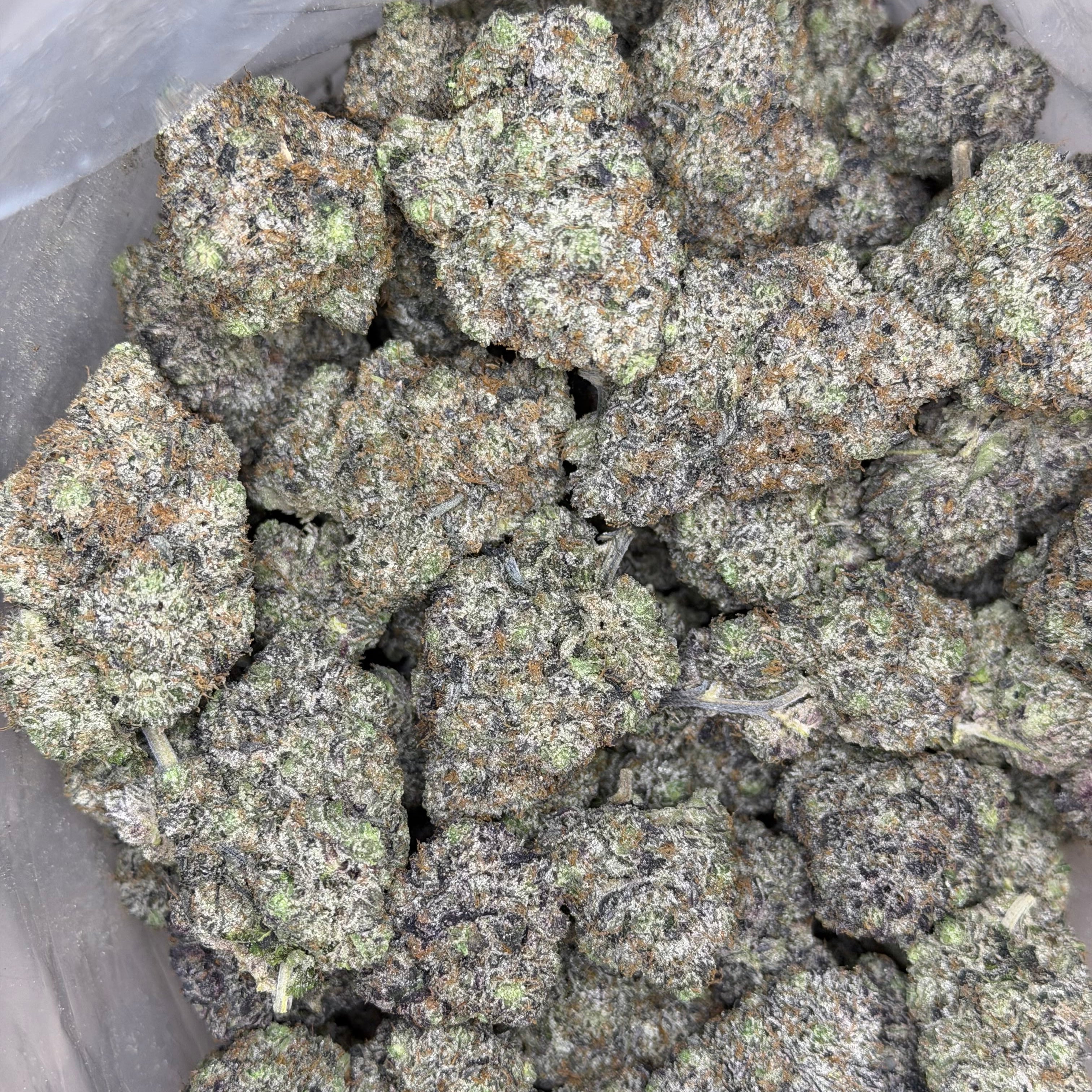 Pink Unicorn AAAAA indica flower showing luxury trichome coverage and tight nug structure – clean burn weed Toronto