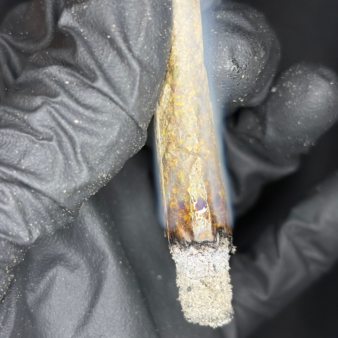 Prada Pink joint – clean white ash burn test showing top-shelf Indica quality, Toronto same-day delivery