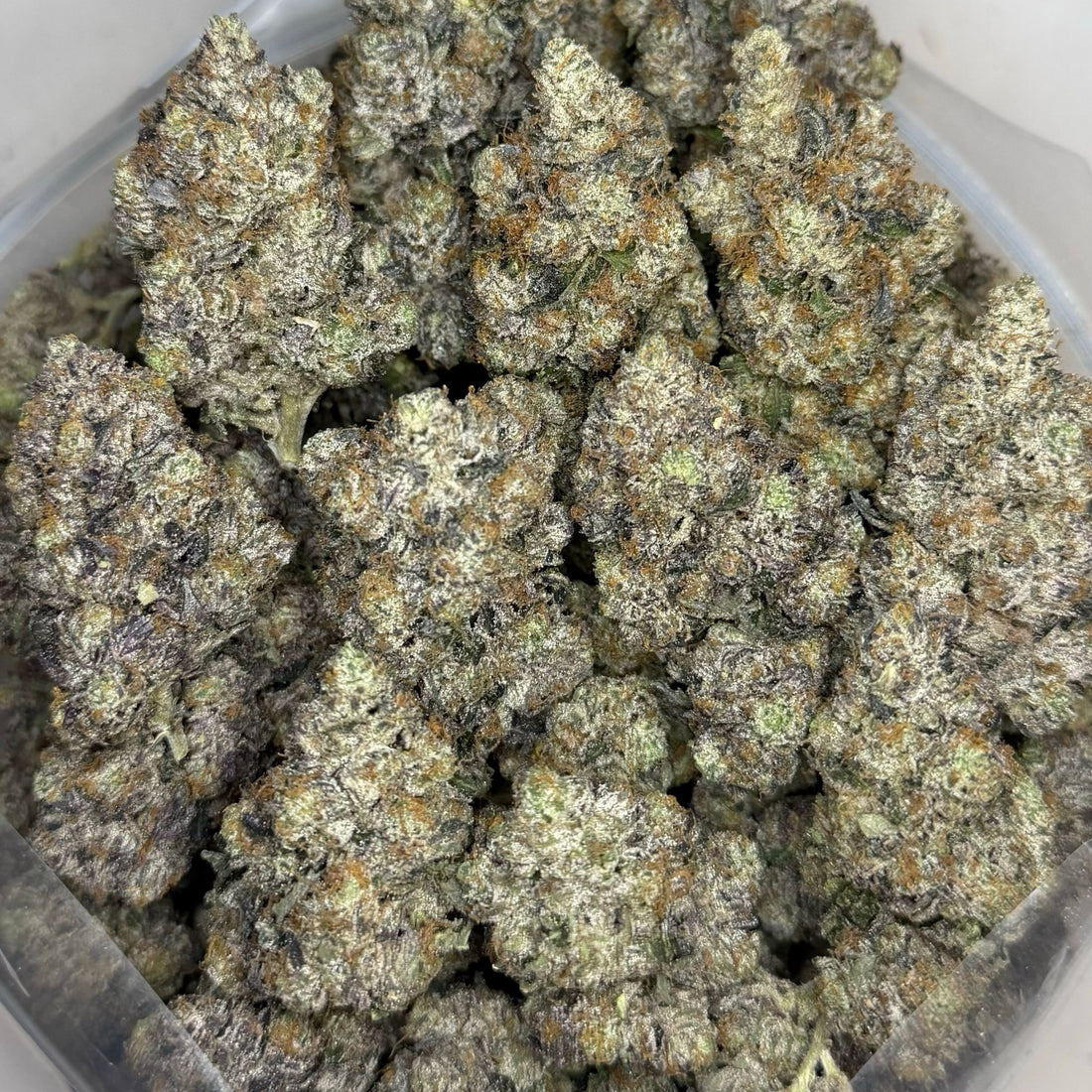 Tropic Truffle AAAAA Sativa dense frosty buds with sweet tropical citrus and luxury gas terpenes